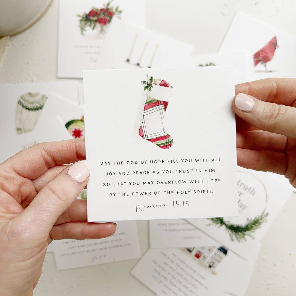 Close-up of Christmas Scripture cards printed on premium 120 lb cotton eggshell textured paper with original watercolor artwork and Bible verses.