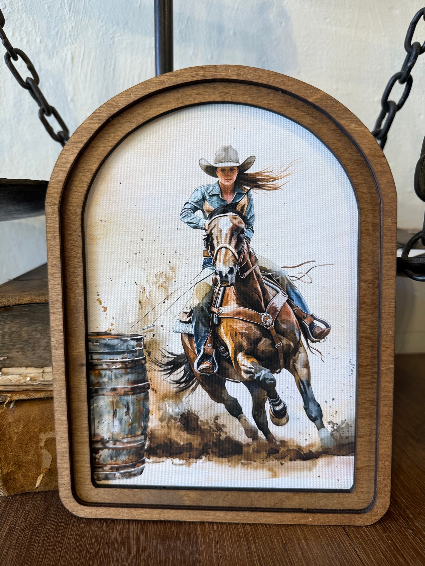 Arch Top Barrel Racer framed canvas art featuring Western equestrian imagery in a double-layered Early American stained wood frame.