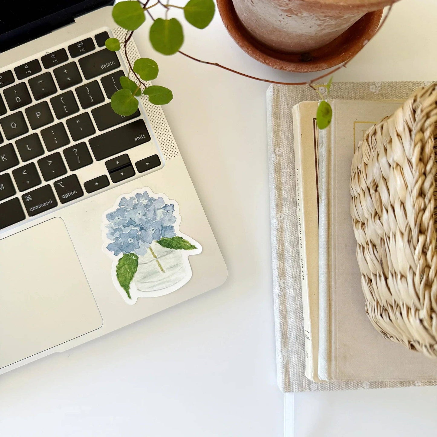 Watercolor illustration of a blooming hydrangea printed on a durable vinyl sticker.