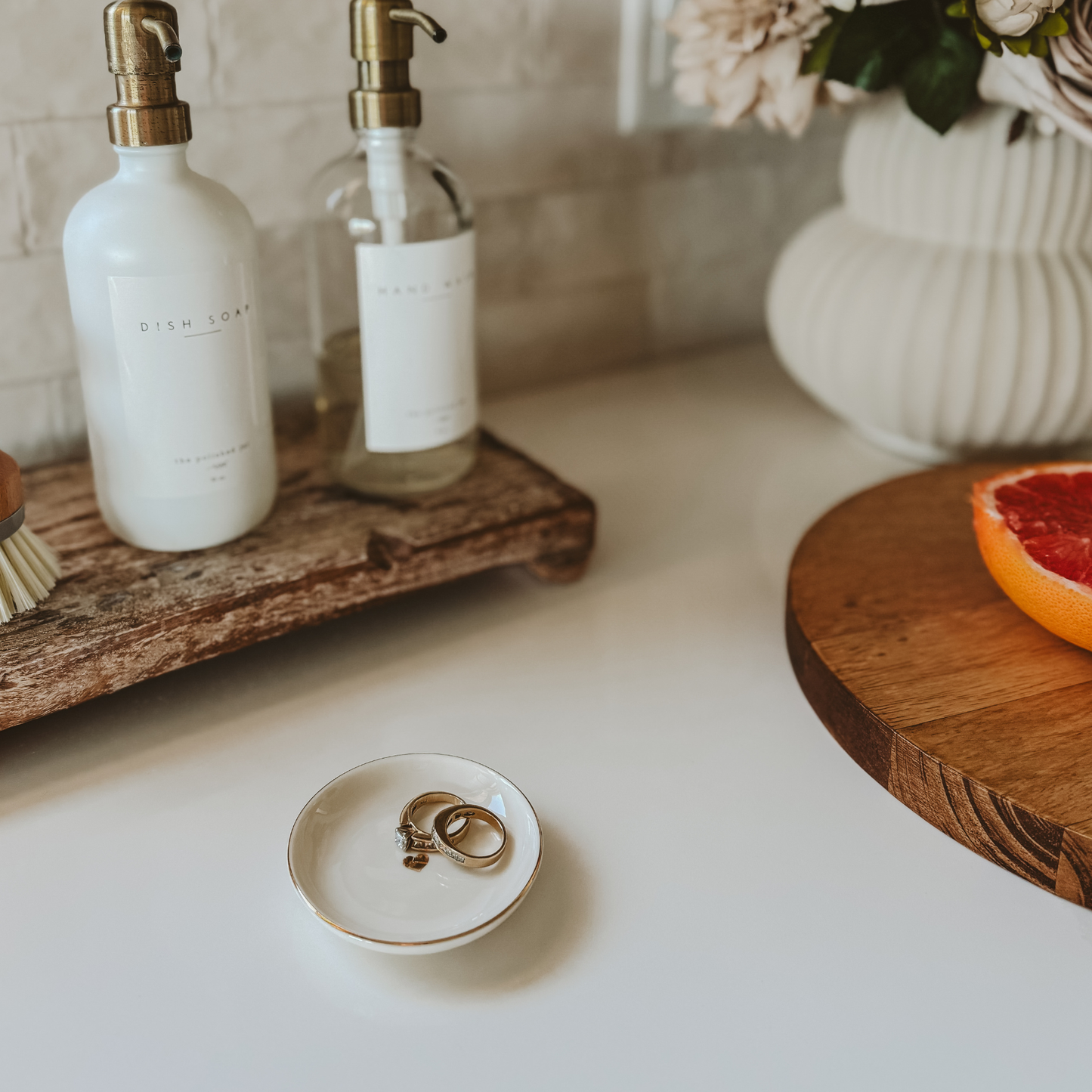 Elegant cream and gold jewelry dish displayed as a thoughtful gift for weddings, anniversaries, or Valentine's Day.