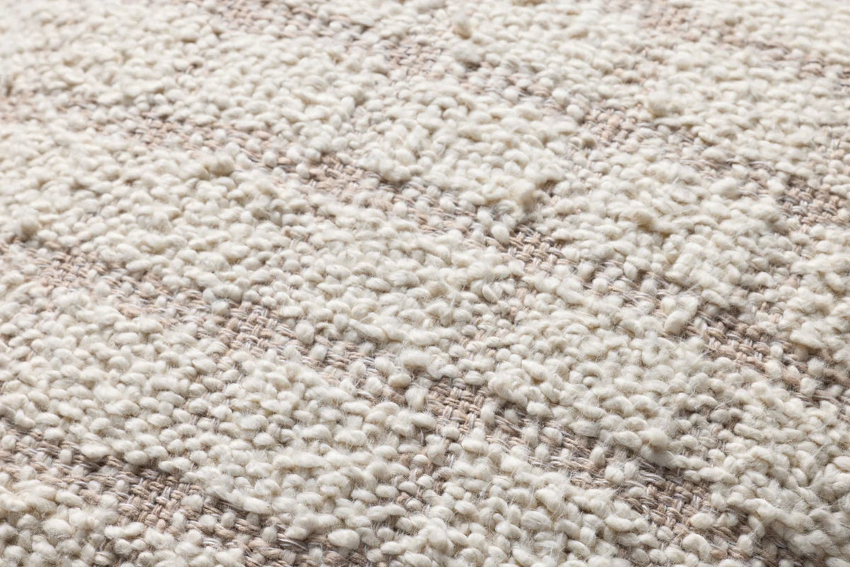Close-up of the Erin pillow highlighting the woven cotton and polyester texture, knife-edge finish, and hidden zipper with antique bronze Magnolia Home logo pull.