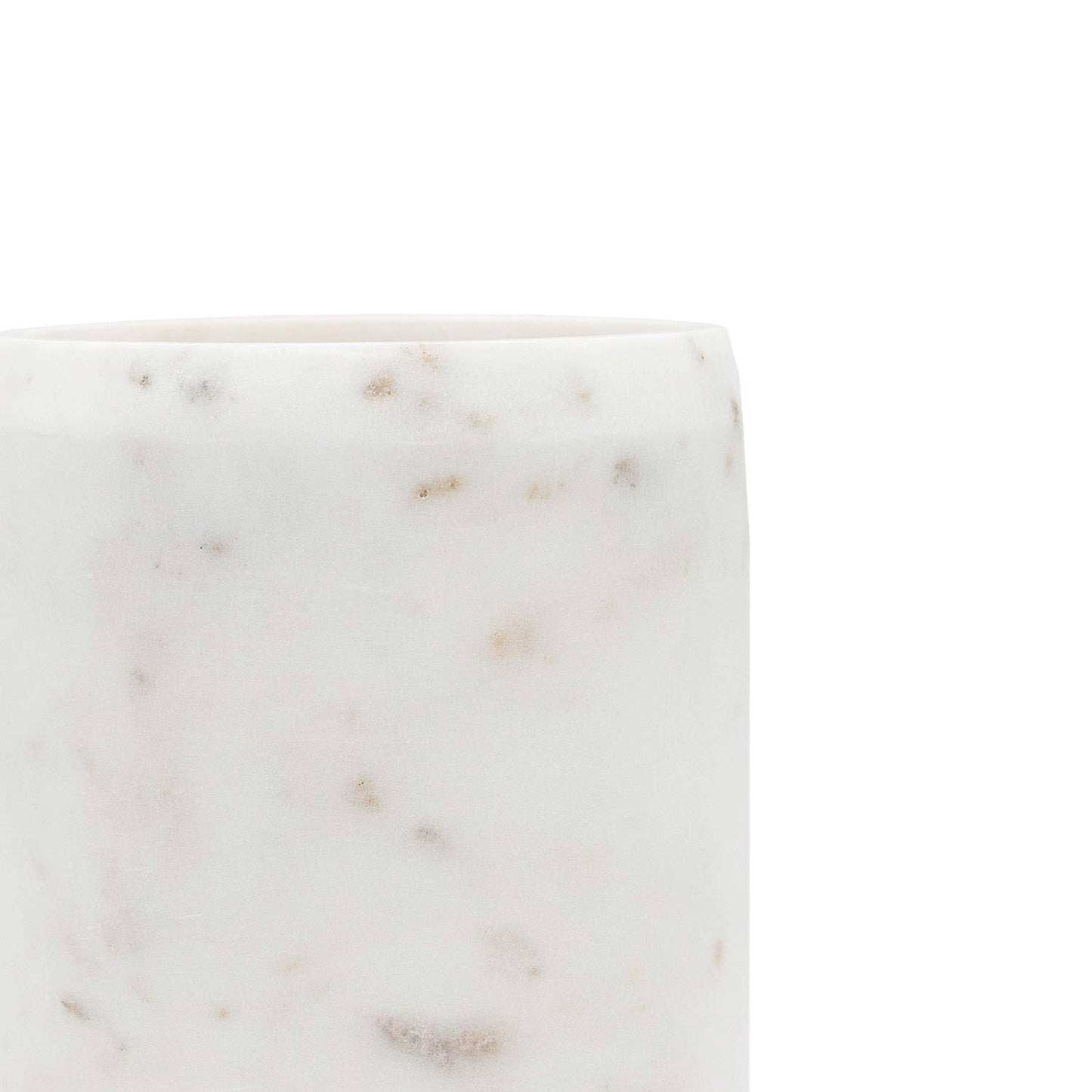 Close-up of authentic white marble showcasing unique natural veining and polished finish.