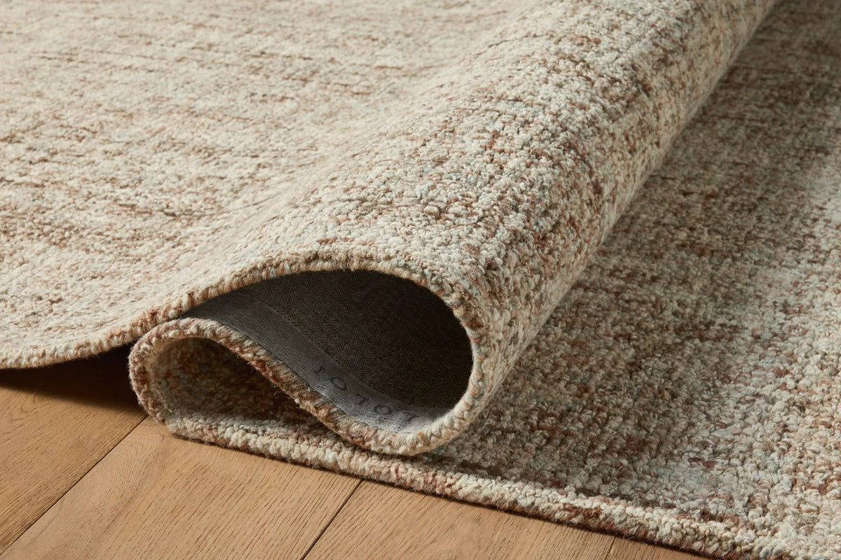 Close-up of the Harlow wool rug highlighting the hand-tufted texture, natural wool fibers, and subtle mocha and mist color variation.