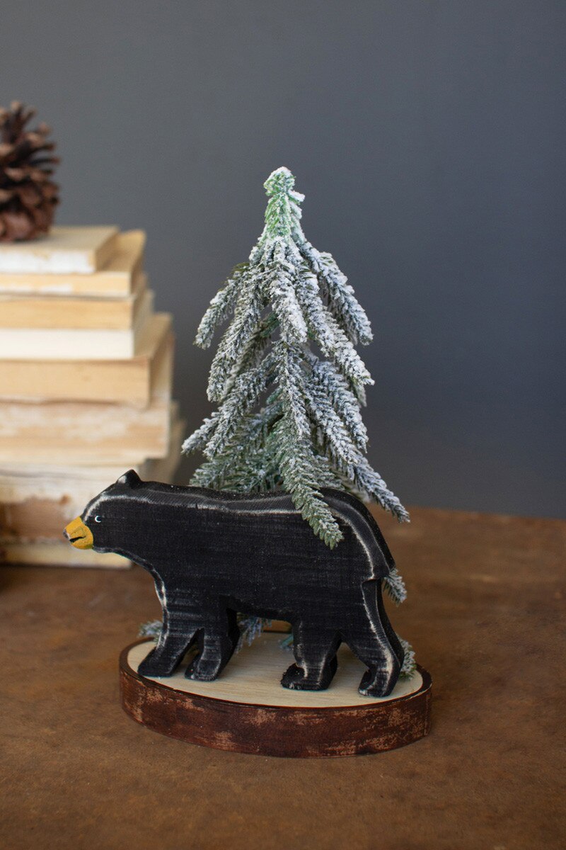 Woodland-inspired wooden bear bringing rustic charm and cozy holiday character to an organic modern home.
