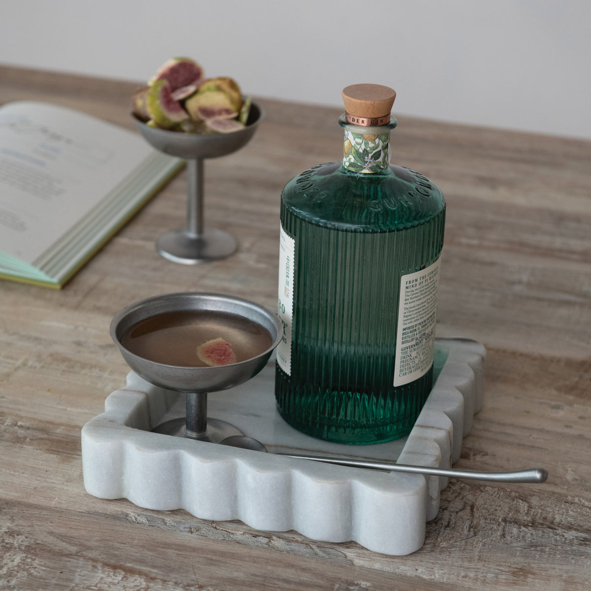 Grey Mélange Scalloped Marble Tray with a square silhouette, softly curved edges, and naturally varied stone veining.
