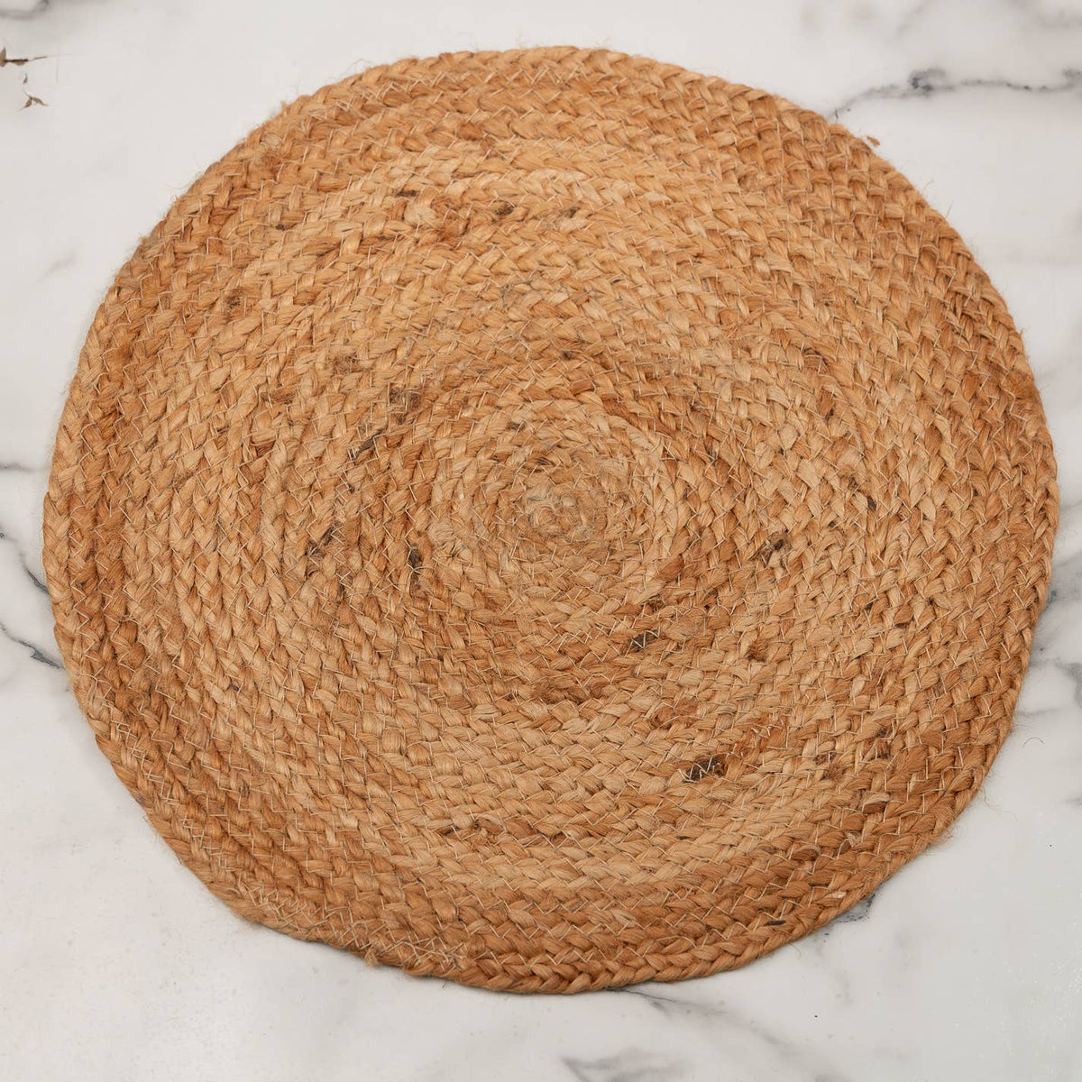14-inch round jute placemat with warm natural color and woven texture.