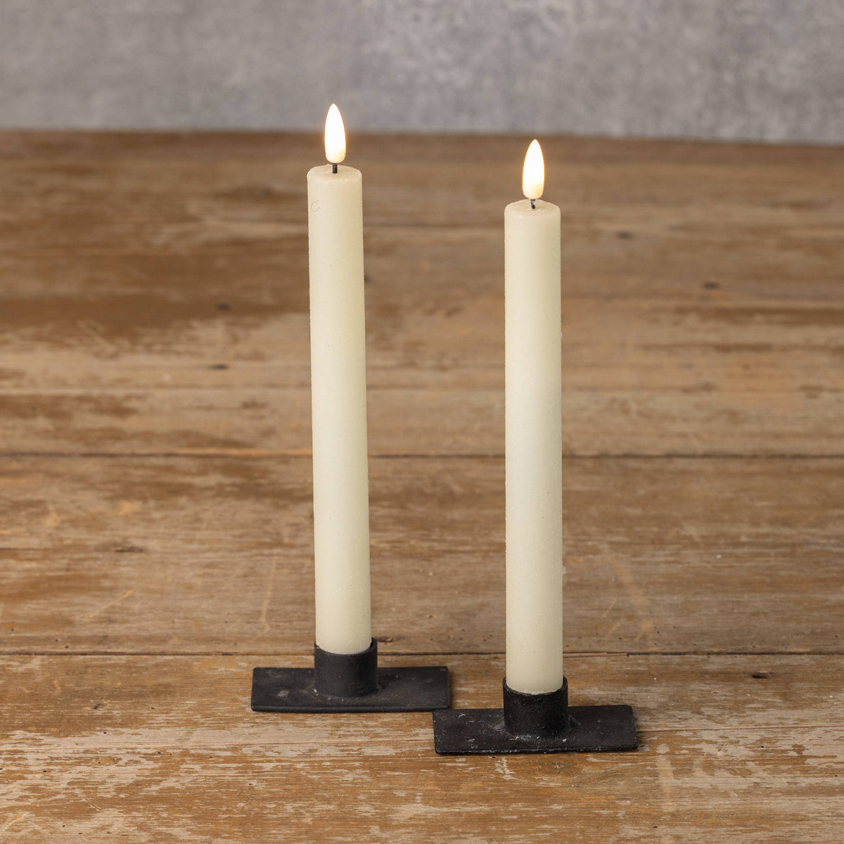 Set of two 9.5-inch cream shimmer taper candles with realistic 3D flames
