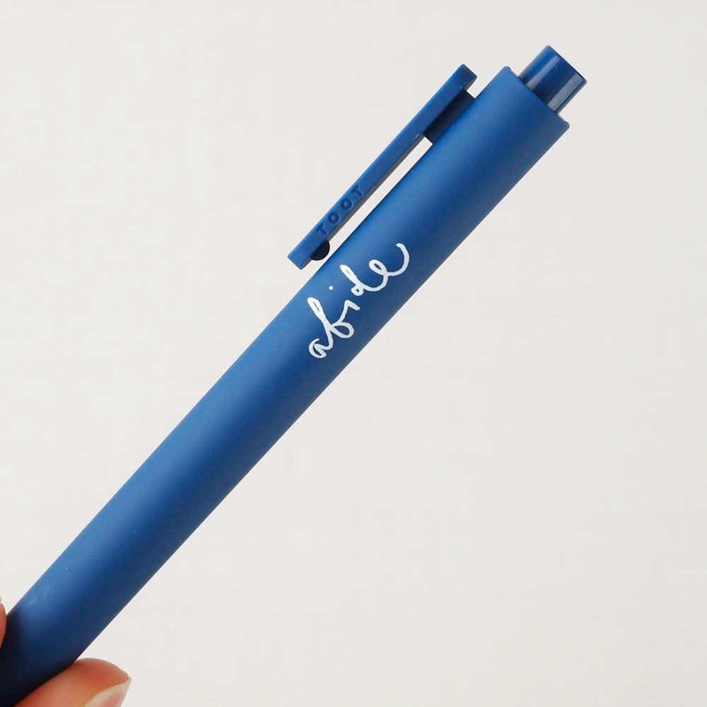 Abide Jotter Pen by Emily Lex with navy matte finish and handwritten sentiment.