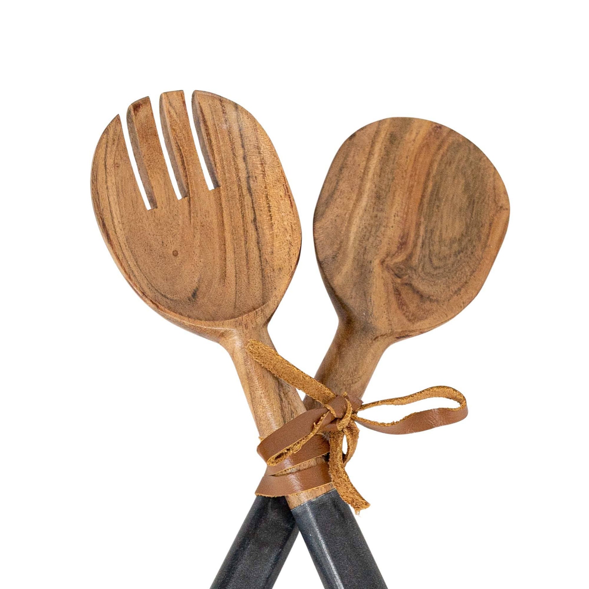 Acacia wood serving utensils featuring elegant natural black marble handles.