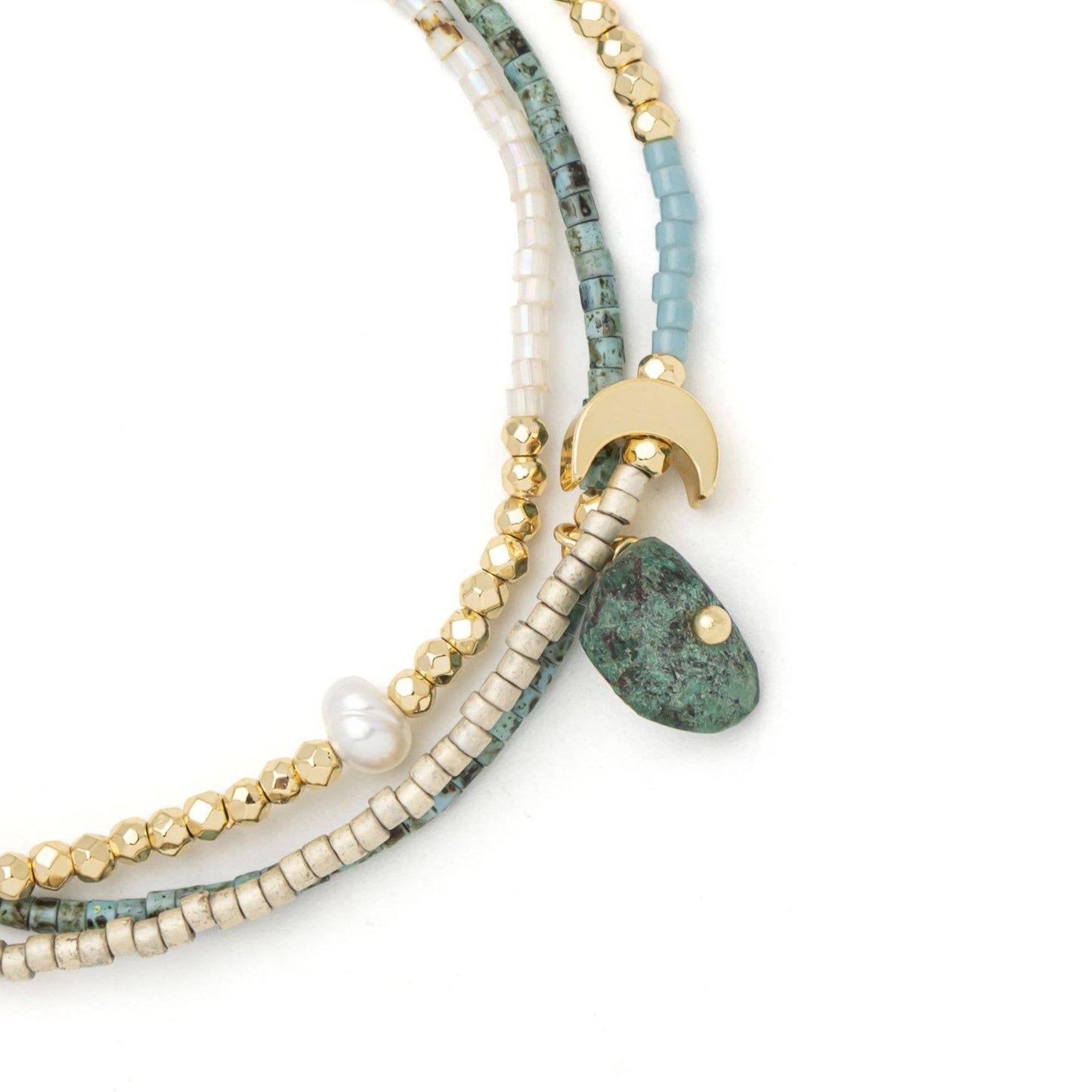 Close-up of handcrafted African Turquoise stones, freshwater pearls, Miyuki beads, and the adjustable pull-tie on the Mixed Media Wrap Bracelet & Necklace.