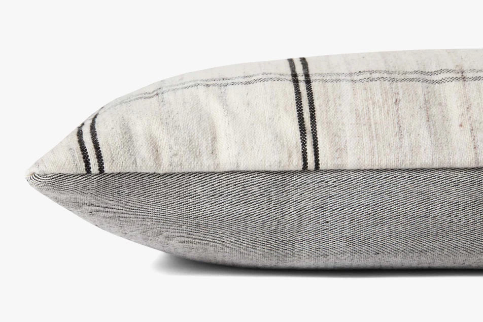 Amber Lewis × Loloi Bell handwoven black and white throw pillow with a plush down insert.