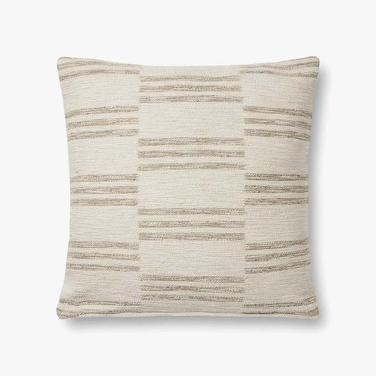 Amber Lewis × Loloi Jay jacquard woven throw pillow in ivory and sand, 22 x 22 inches.