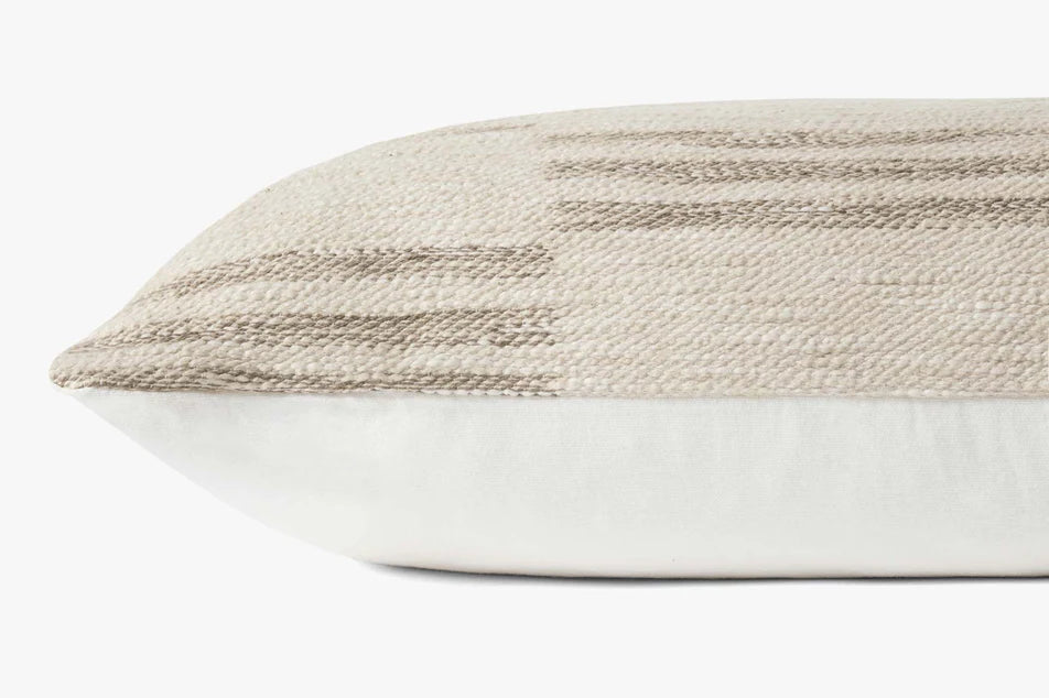 Close-up of the jacquard woven cotton and polyester texture on the Amber Lewis Jay pillow.