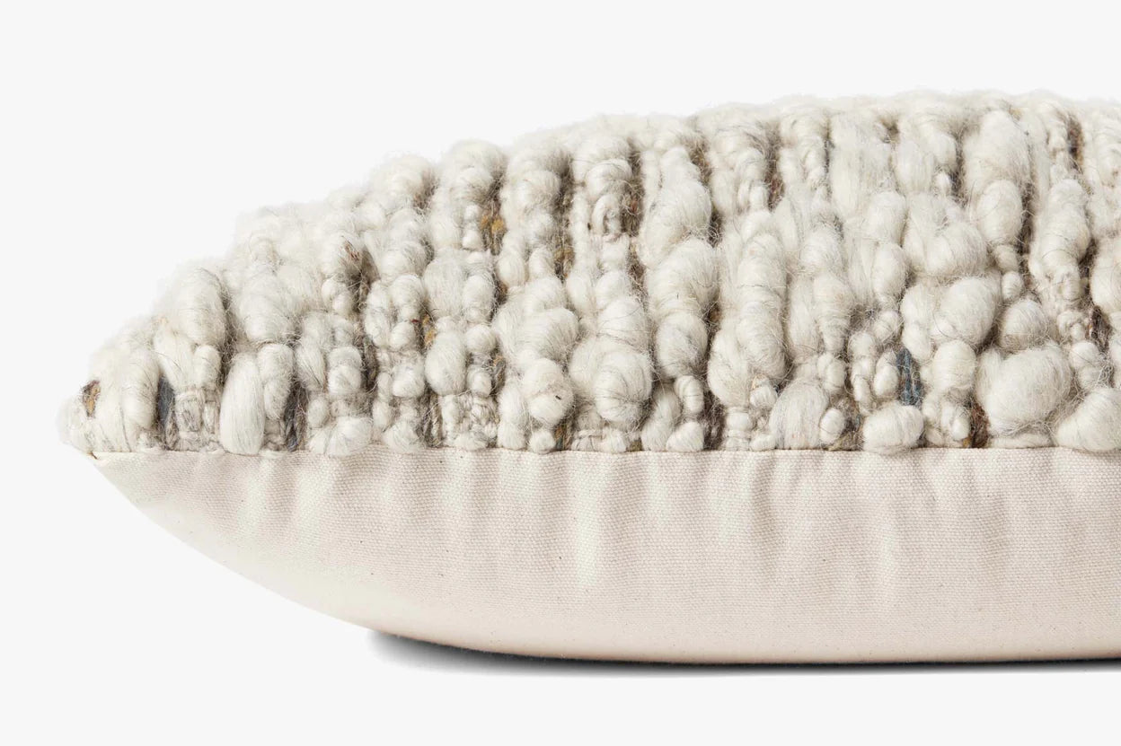Close-up of the handwoven wool and cotton texture on the Amber Lewis Vivienne lumbar pillow.