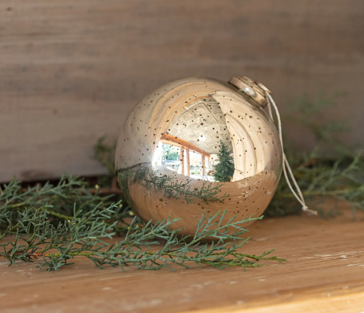 Round 5-inch antique silver mercury glass Christmas ornament with a softly reflective vintage-inspired finish.