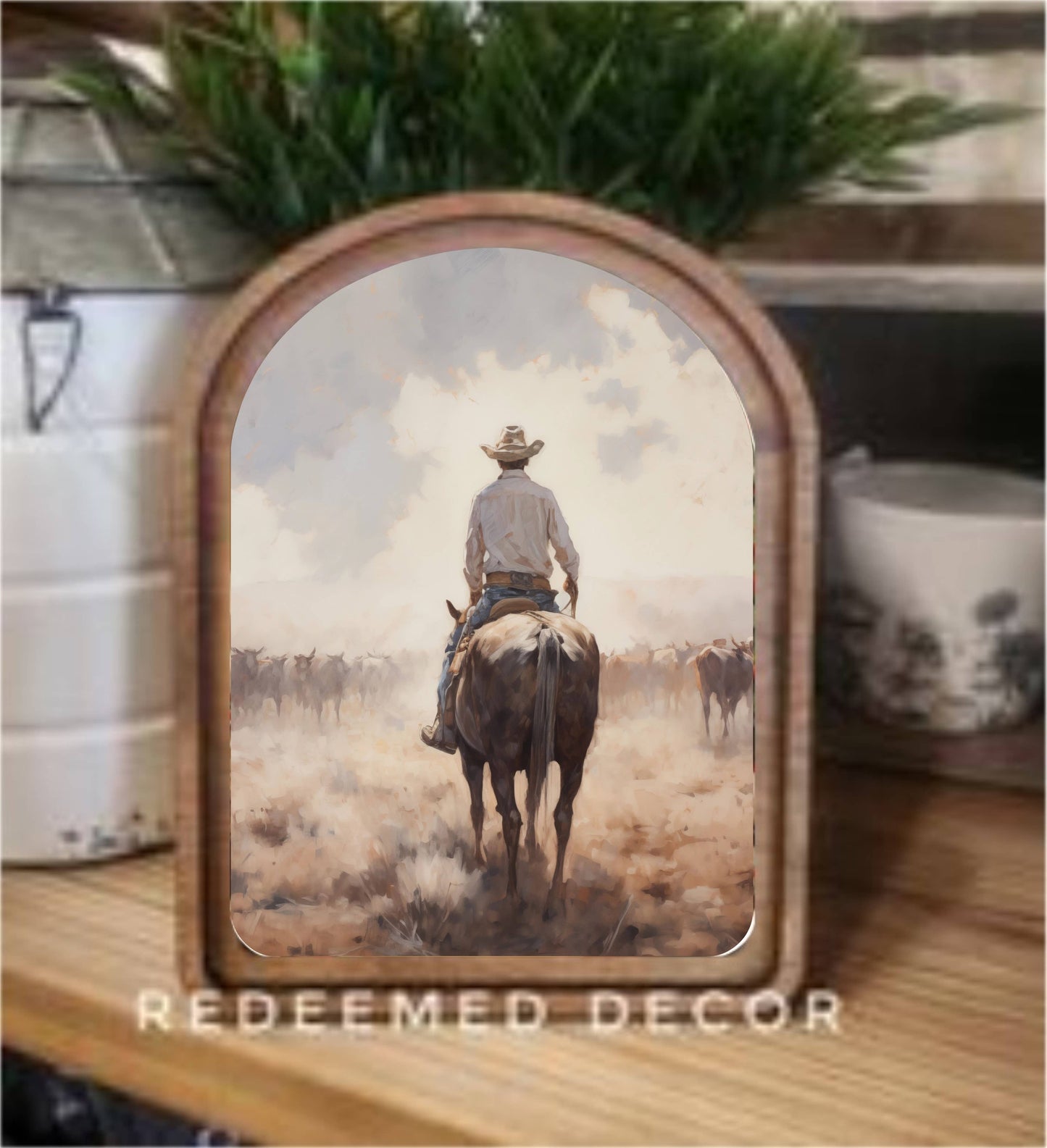 Arch Top Cattle Drive Framed Canvas Art featuring a classic Western cattle drive scene in a handcrafted arched wood frame with an Early American finish.