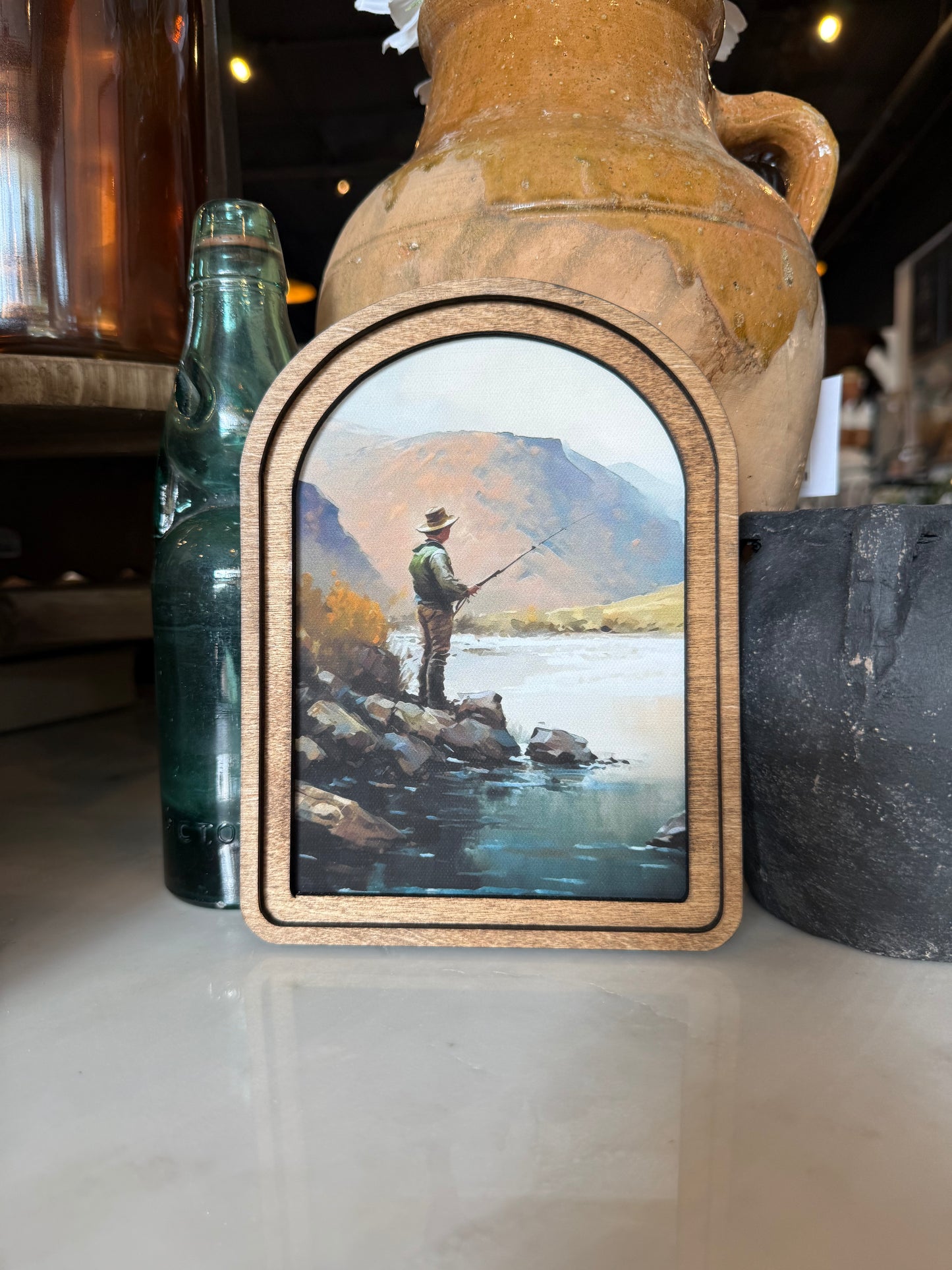 Arch Top Fisherman framed canvas art in a double-layered Early American stained wood frame, handcrafted in Twin Falls, Idaho.