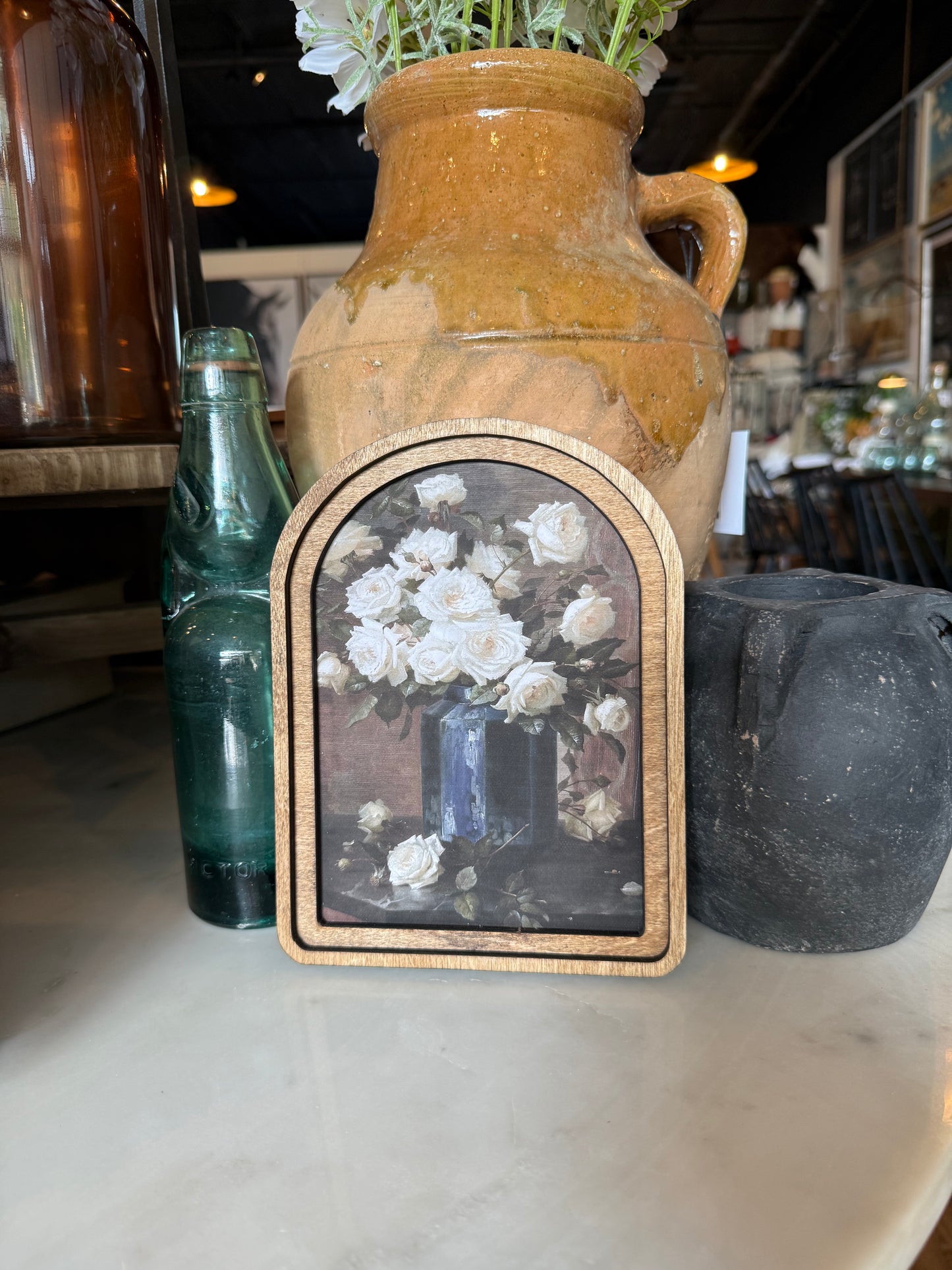 Arch Top Moody Roses Framed Canvas Art featuring richly detailed roses in a handcrafted arched wood frame with an Early American finish.
