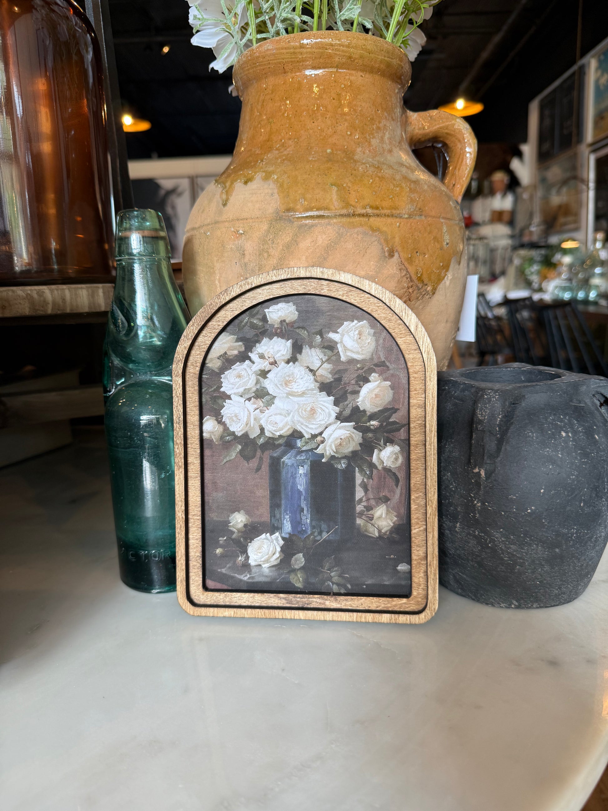Arch Top Moody Roses Framed Canvas Art featuring richly detailed roses in a handcrafted arched wood frame with an Early American finish.