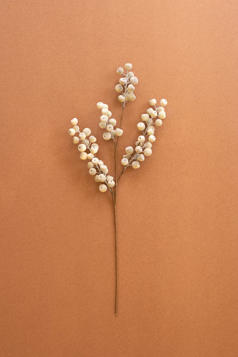 Artificial white berry spray with delicate branching stems and soft white berry clusters.