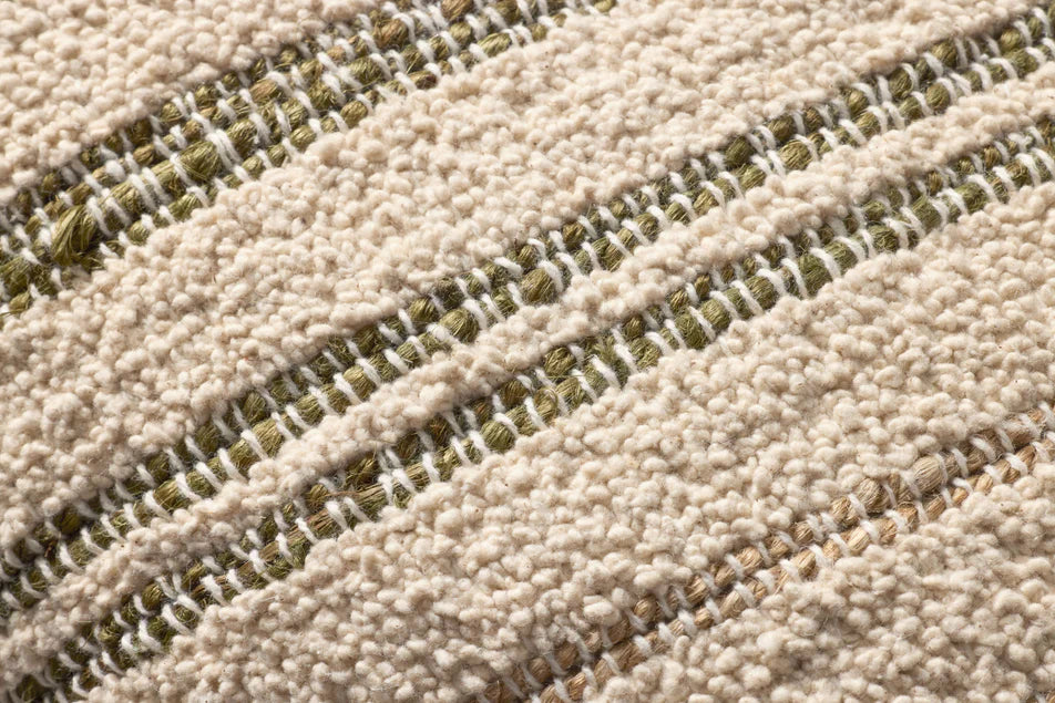 Close-up of the woven cotton and jute texture on the Amber Lewis Atley pillow.