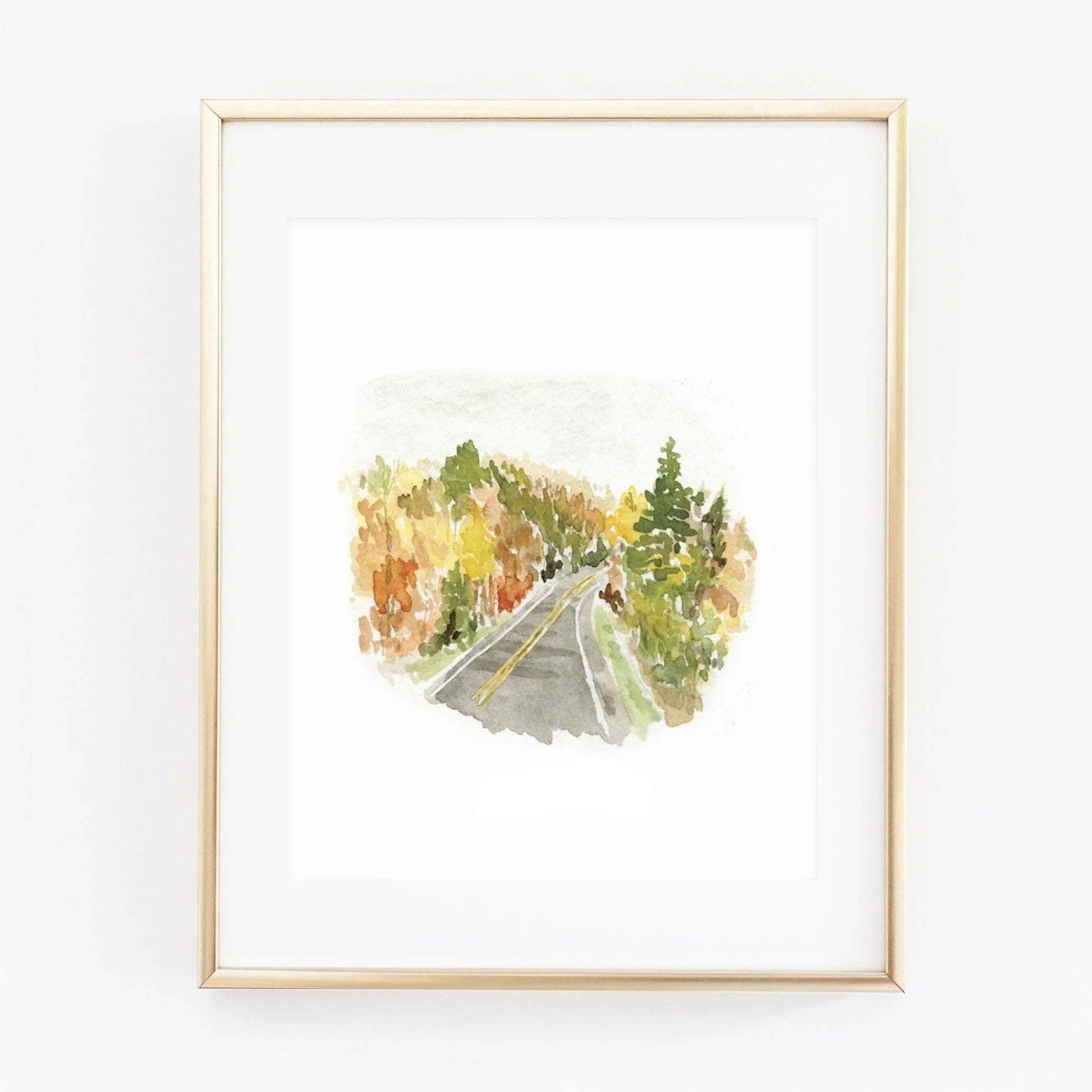 Autumn Road Landscape Watercolor Art Print by Emily Lex featuring an original watercolor painting of a quiet country road surrounded by colorful fall foliage.
