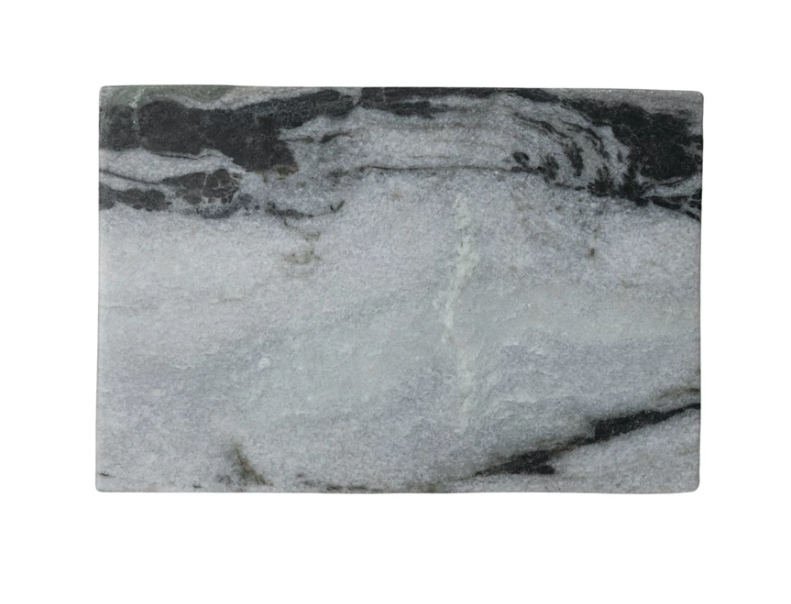 Black marble cutting and serving board featuring natural stone veining and a polished finish.
