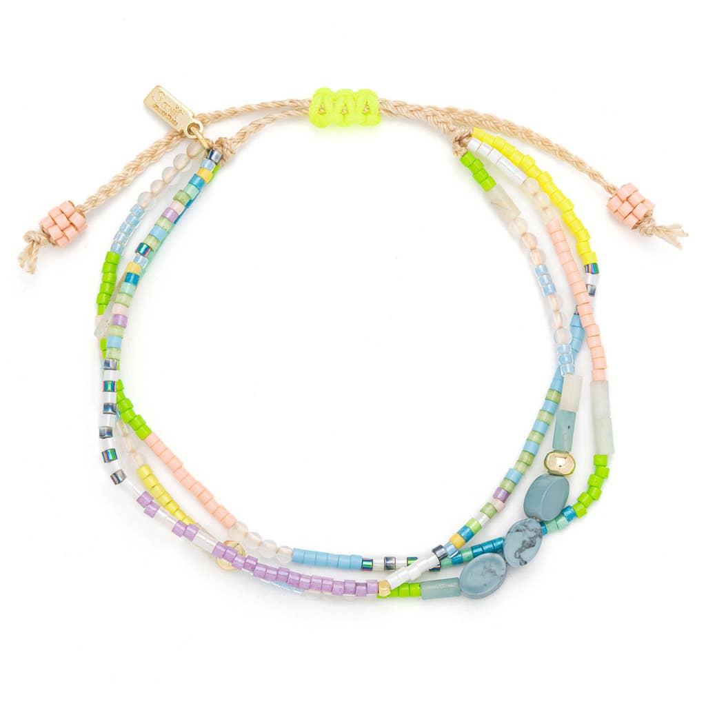 Close-up of Blue Howlite gemstones, Miyuki beads, and adjustable cord on the Harmony Mixed Media Bracelet.