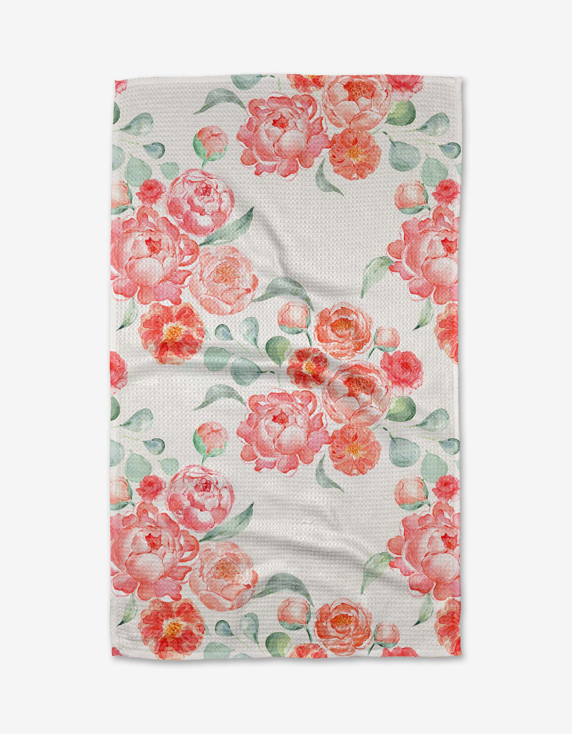 Floral patterned towel with pink and orange flowers on a white background