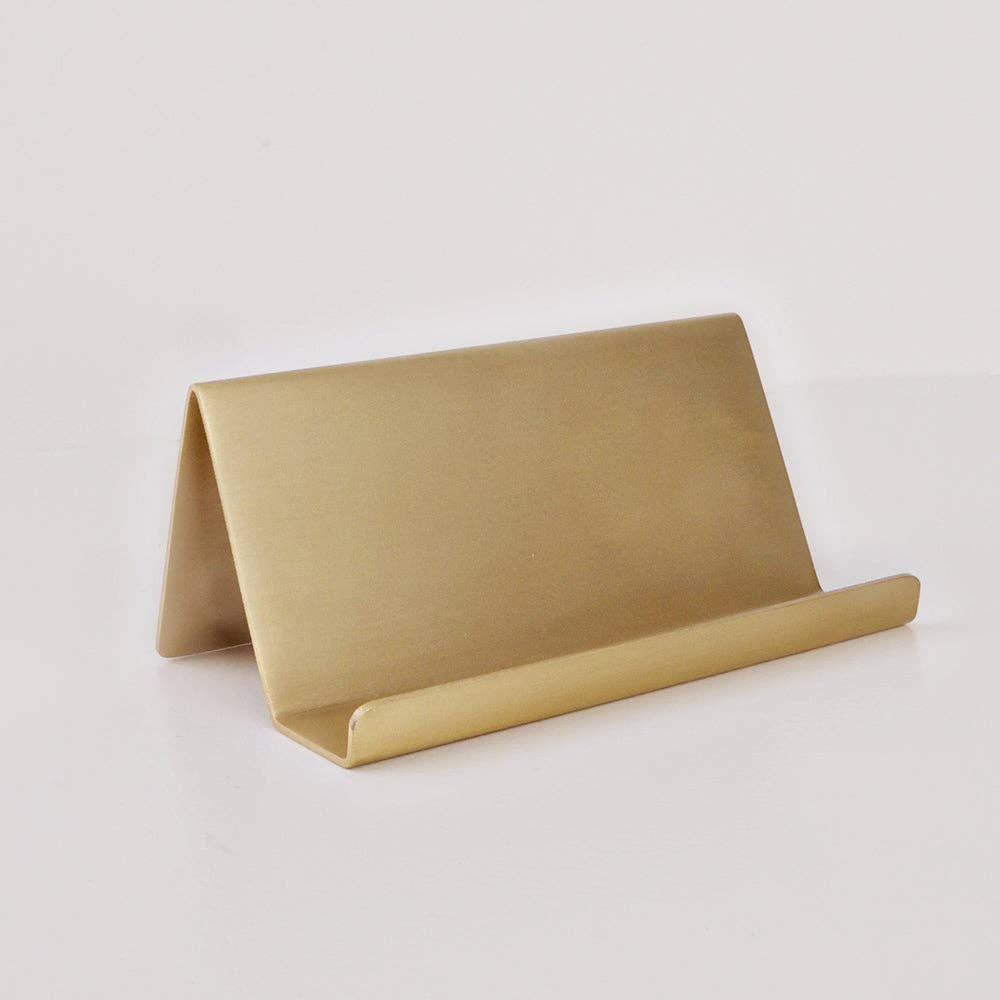 Close-up of the solid brass card holder showing its elegant finish and ability to hold daily Scripture cards.