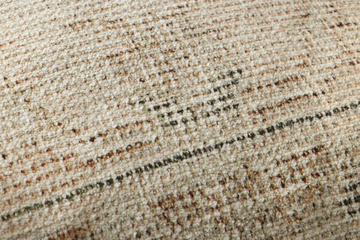 Close-up of the woven polyester and cotton fabric on the Amber Lewis Celestia pillow.