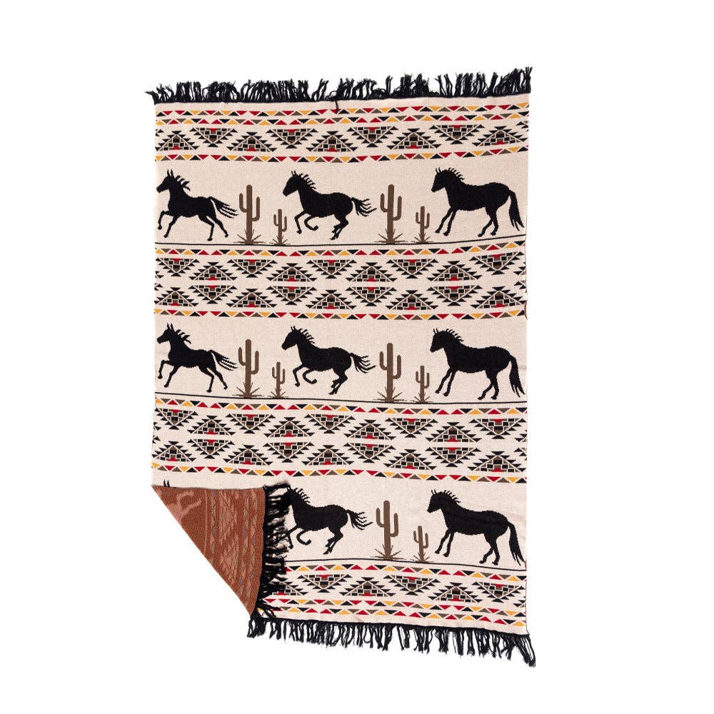 Chisholm Trail Woven Throw Blanket featuring running horses, tribal-inspired geometric patterns, and saguaro cacti in a timeless Western design.