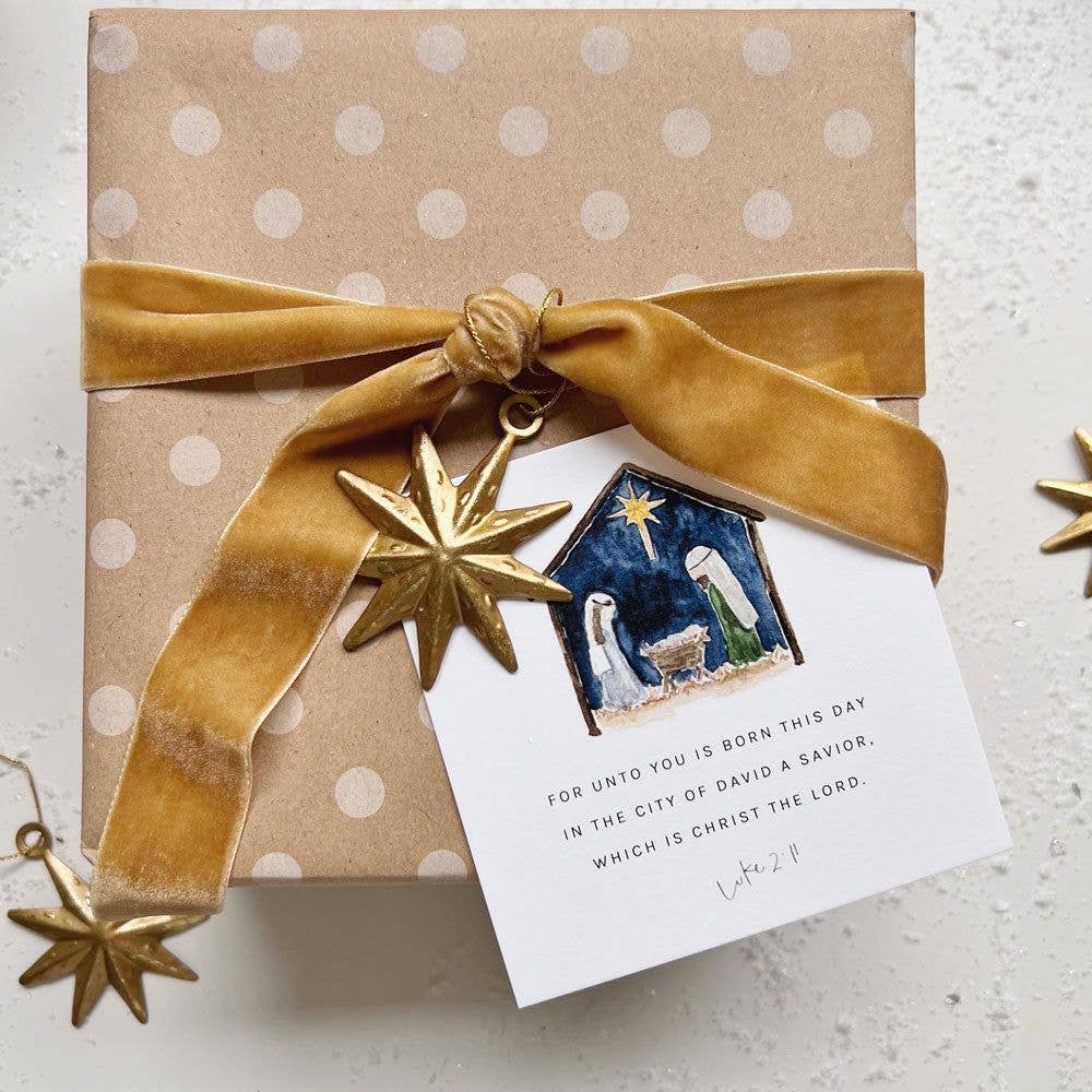 Close-up of Christmas Scripture cards printed on premium 120 lb cotton eggshell textured paper with original watercolor artwork and Bible verses.