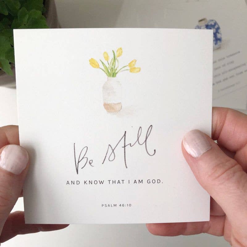 Close-up of 4-inch square Scripture cards with original watercolor artwork and encouraging Bible verses printed on textured cotton paper.