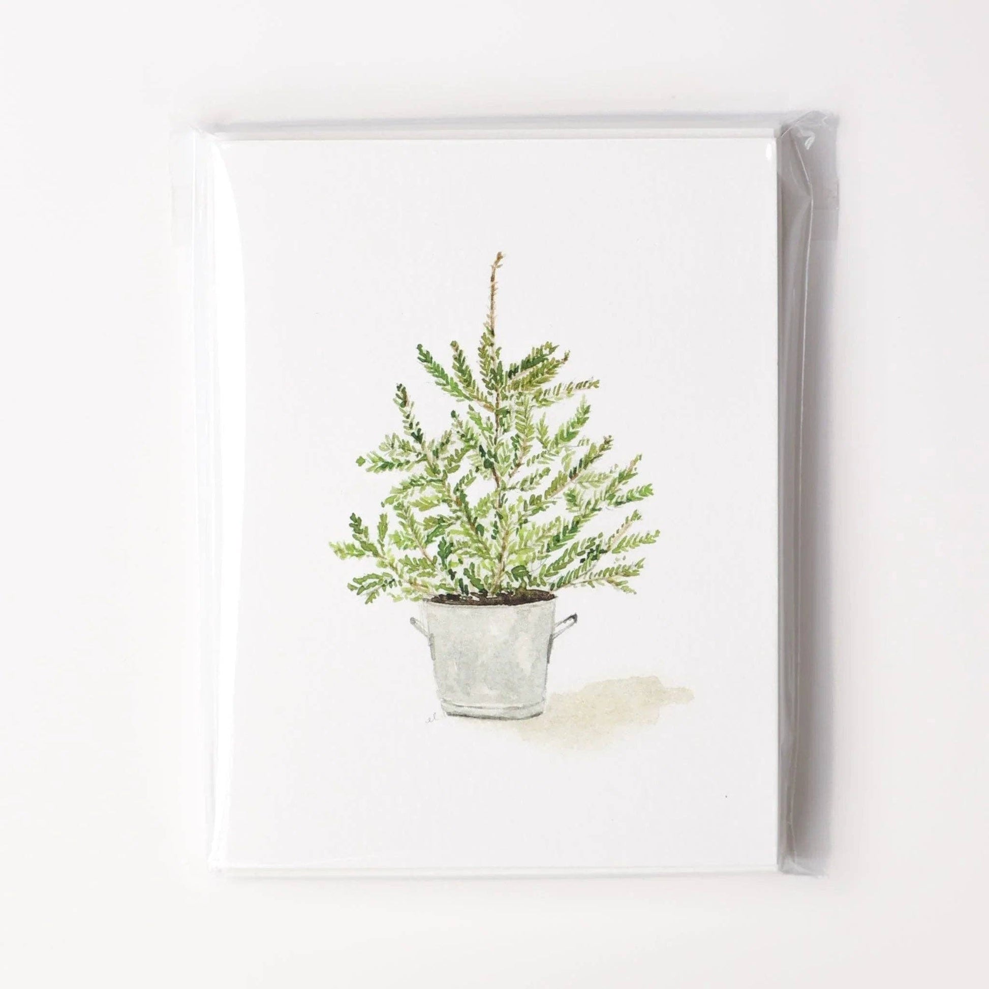 Assorted Christmas watercolor notecards printed on premium 120 lb superfine paper with blank interiors for personalized holiday messages.