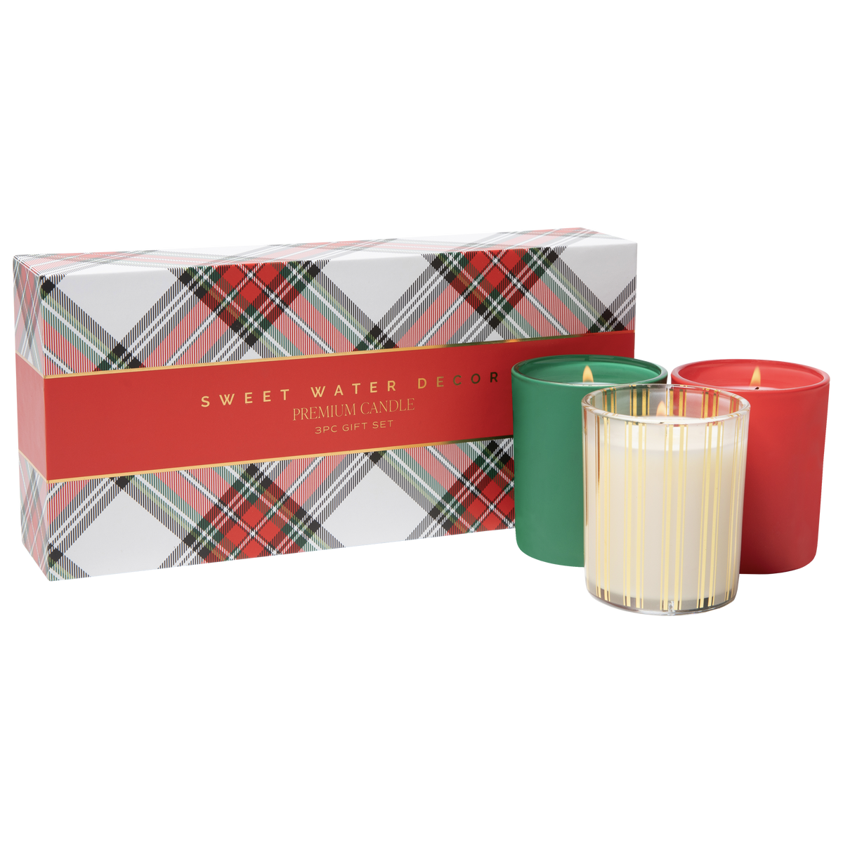 Fraser Fir, Christmas, and Warm & Cozy candles displayed together in coordinating holiday glass vessels.