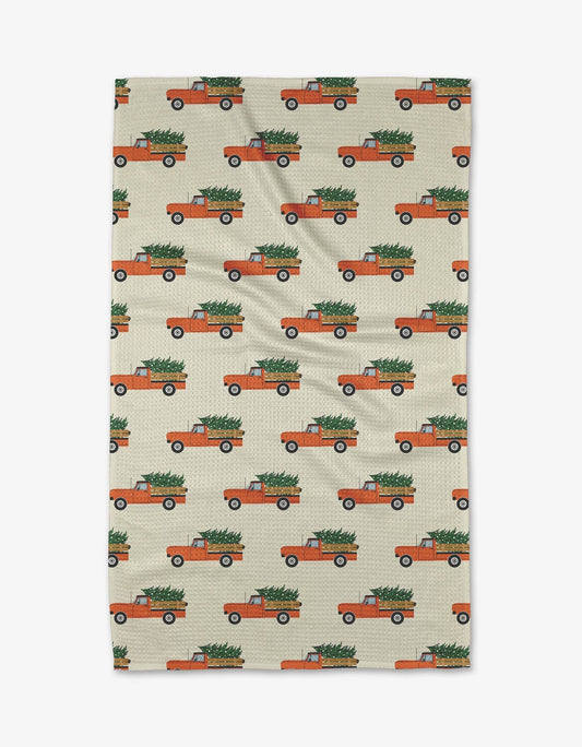 Christmas Ride Geometry tea towel featuring a festive holiday design on a quick-drying waffle weave kitchen towel.