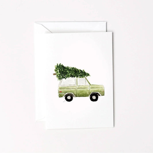 Christmas Tree Truck Mini Enclosure Card by Emily Lex featuring an original watercolor illustration of a vintage truck carrying a Christmas tree.