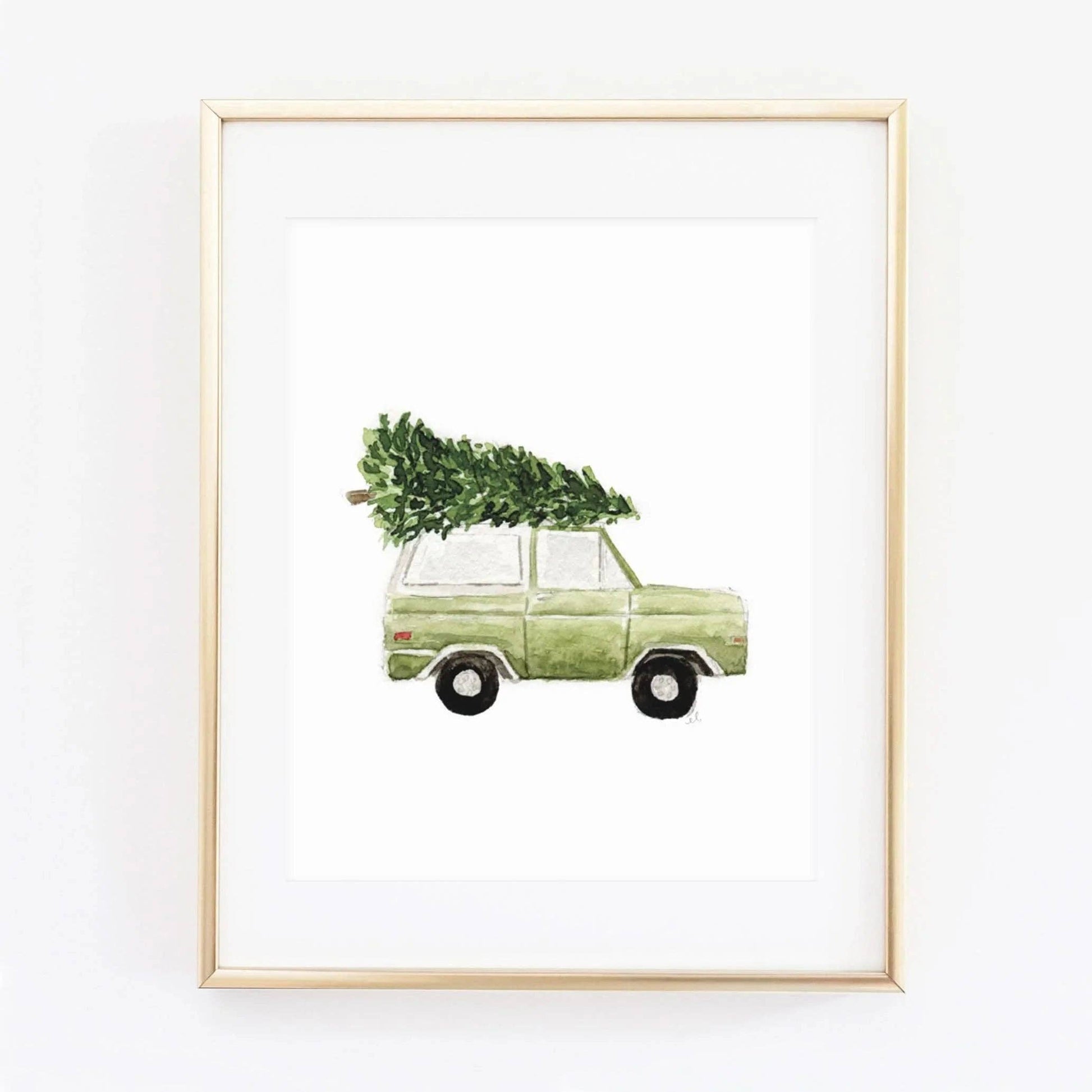 Christmas Tree Truck Watercolor Art Print by Emily Lex featuring a vintage truck carrying a freshly cut evergreen tree.