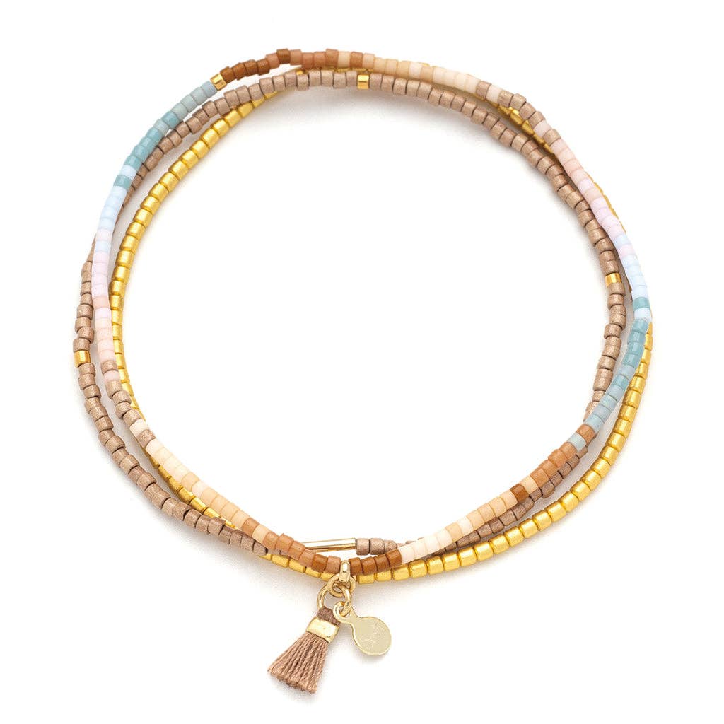 Chromacolor Miyuki Bracelet Trio featuring three stretch bracelets with Desert Multi Miyuki beads and gold-dipped accents.