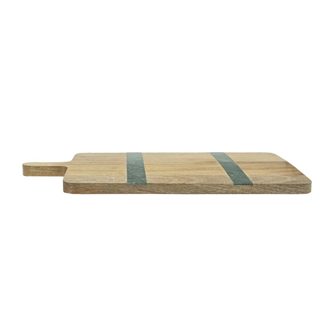 Green marble and mango wood serving board arranged with artisan cheeses, bread, and charcuterie.