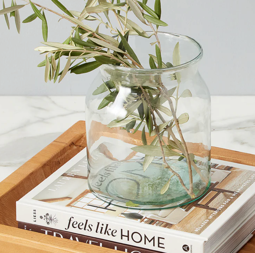 Vintage inspired clear mason jar styled with fresh flowers in a collected old-world inspired home