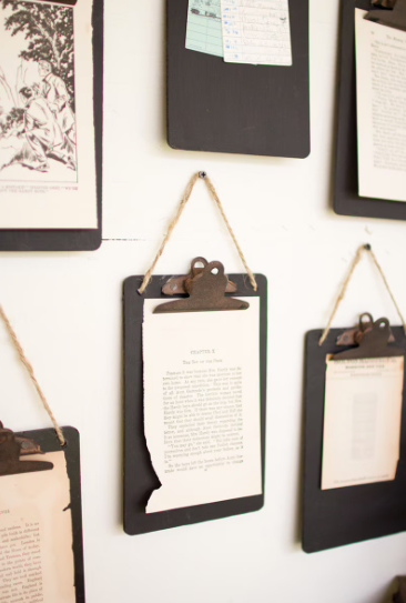 Clipboard chalkboard with a natural jute hanger for displaying notes and photos.