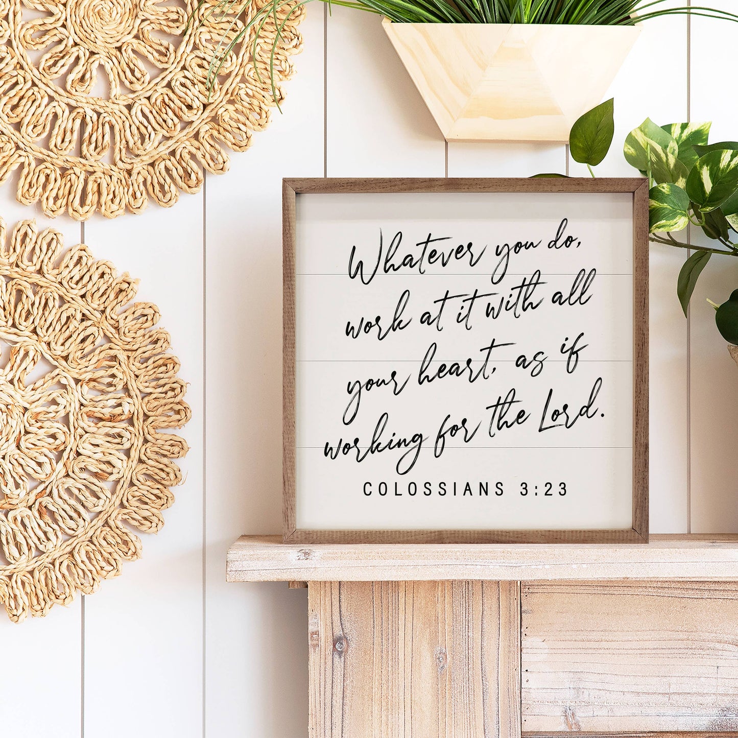 Whatever You Do scripture wall art displayed on a mantel with natural wood and greenery, offering daily encouragement.