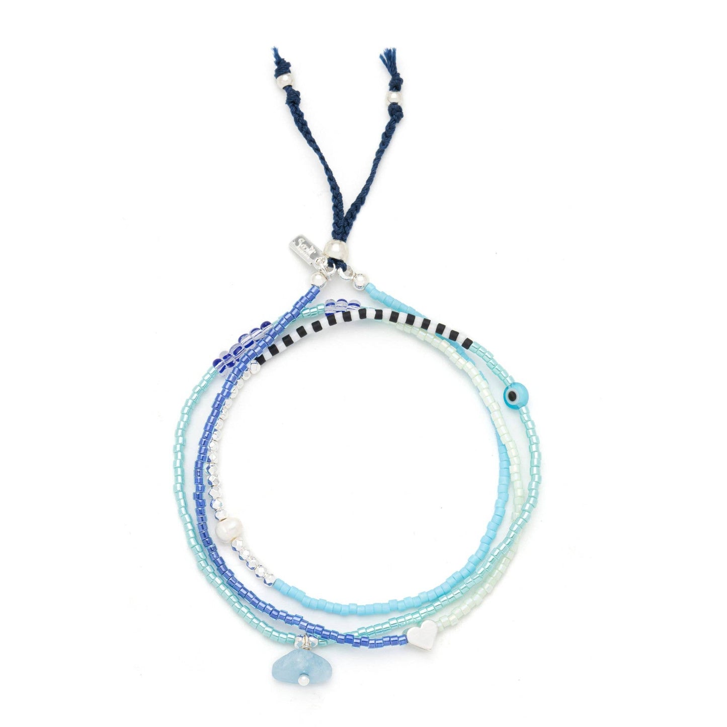 Close-up of handcrafted aquamarine stones, freshwater pearls, Miyuki beads, and adjustable pull-tie on the Mixed Media Wrap Bracelet & Necklace.