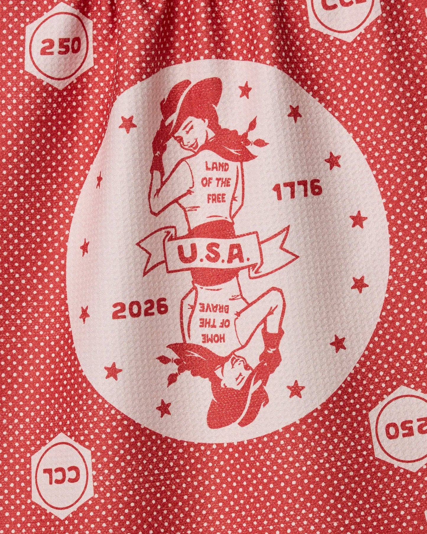 Close-up of the red USA Cowgirl tea towel showing Geometry's tightly woven, quick-drying Geoweave fabric.