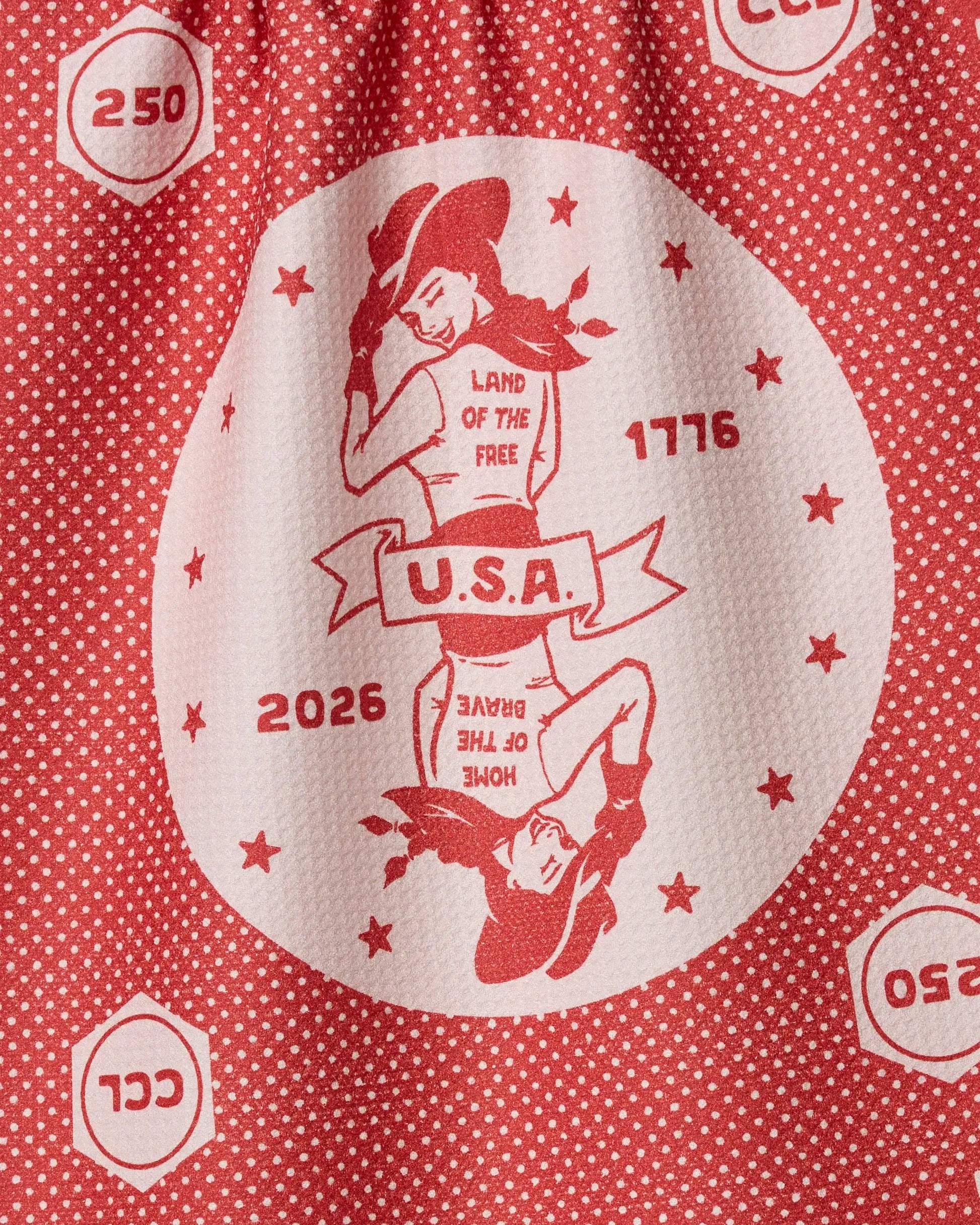 Close-up of the red USA Cowgirl tea towel showing Geometry's tightly woven, quick-drying Geoweave fabric.