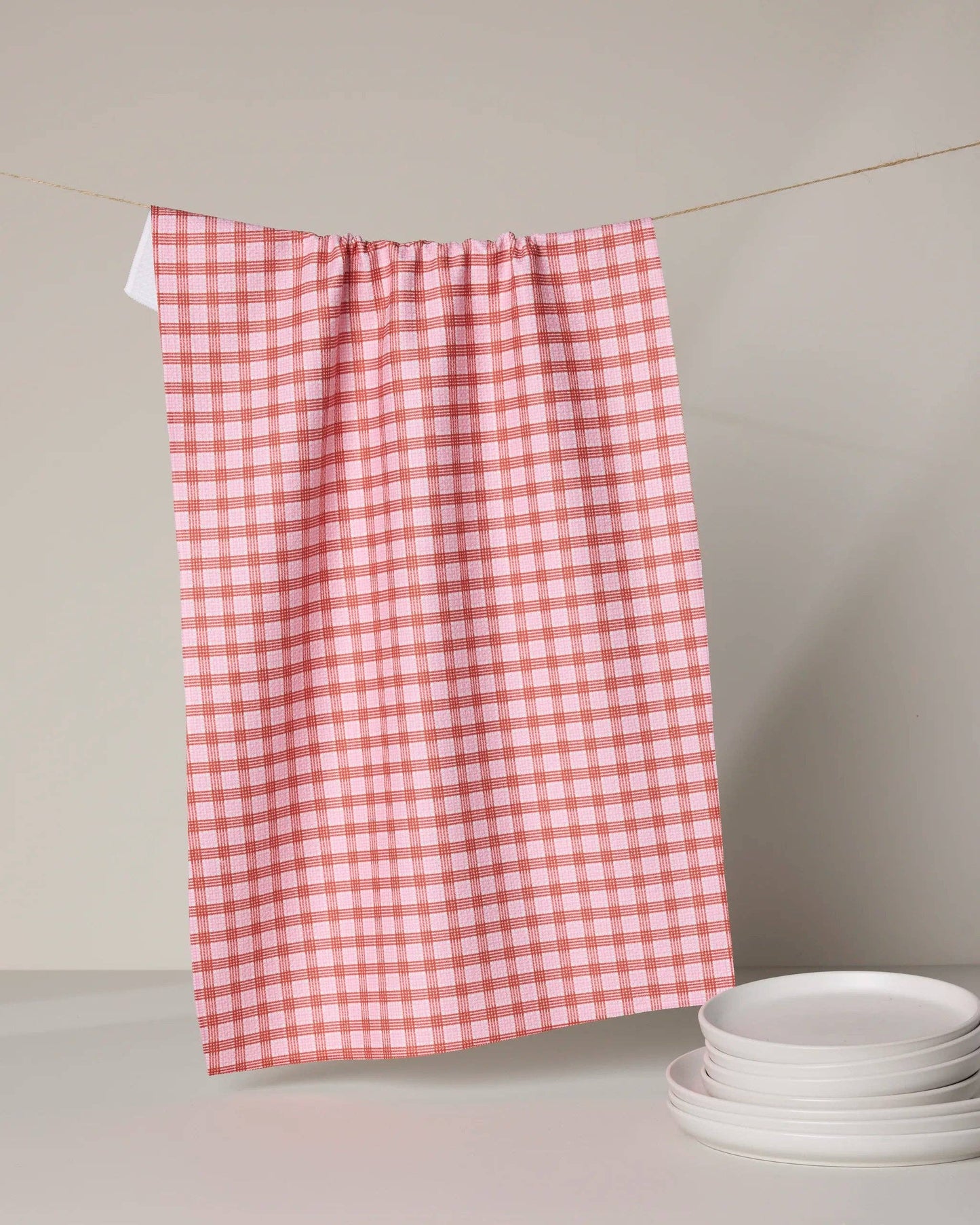 Cupid’s Plaid Tea Towel featuring seasonal Valentine-inspired plaid design by Geometry.