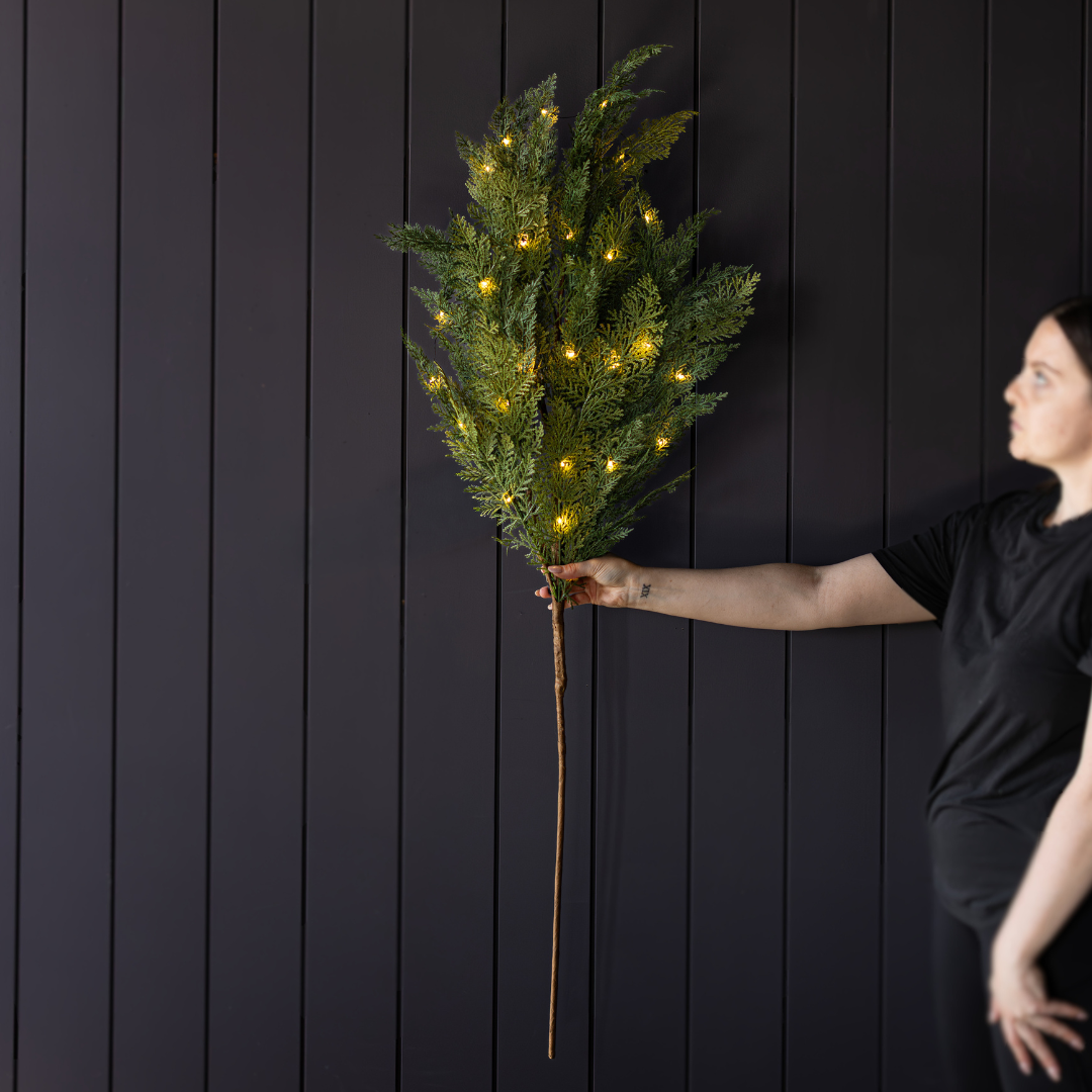 Close-up of lifelike cypress leaves featuring realistic Real Touch texture and natural green coloring.