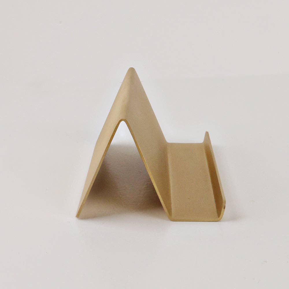 Close-up of the solid brass card holder showing its elegant finish and ability to hold daily Scripture cards.